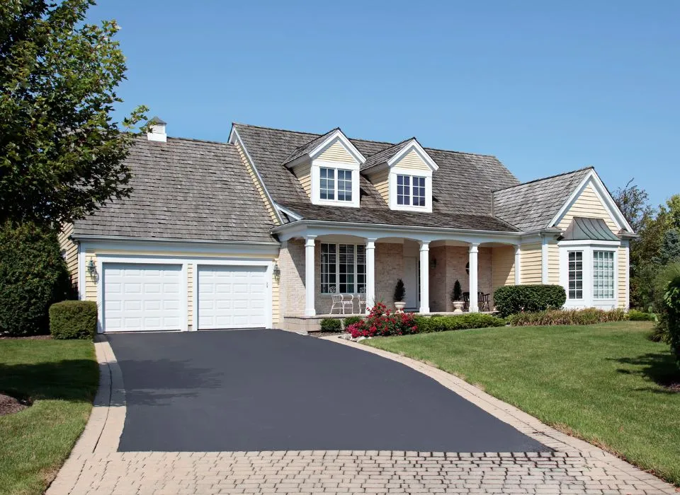 Large-scale paver driveway with custom borders and curved design in Los Angeles by Dream Patios LA.