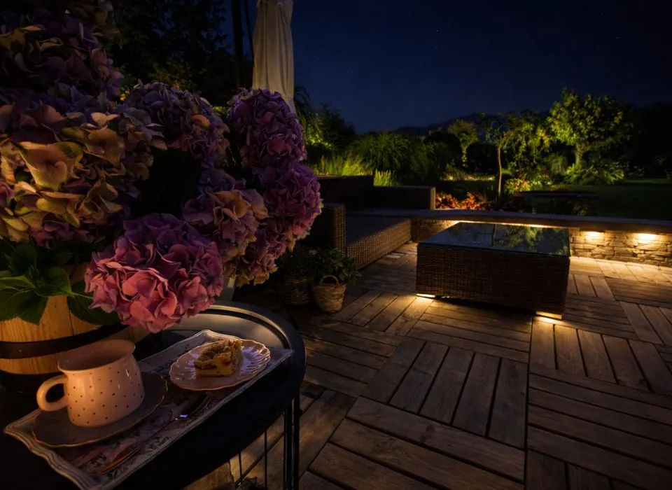 Panoramic view of a luxury backyard with full LED outdoor lighting and custom hardscape by Dream Patios LA in Los Angeles.